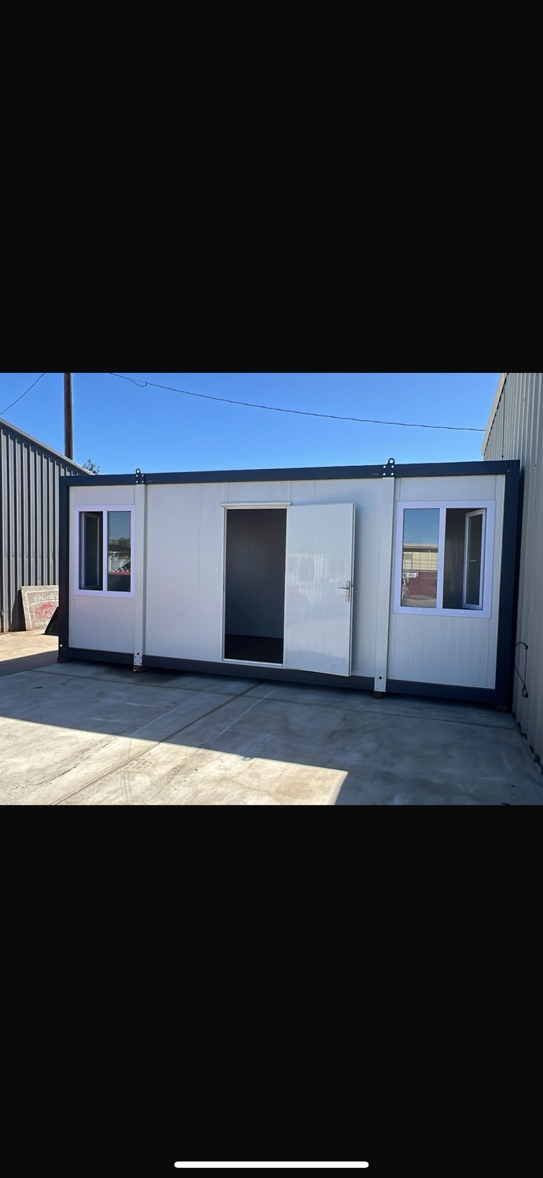 EROUnits office with open entry door at a project site